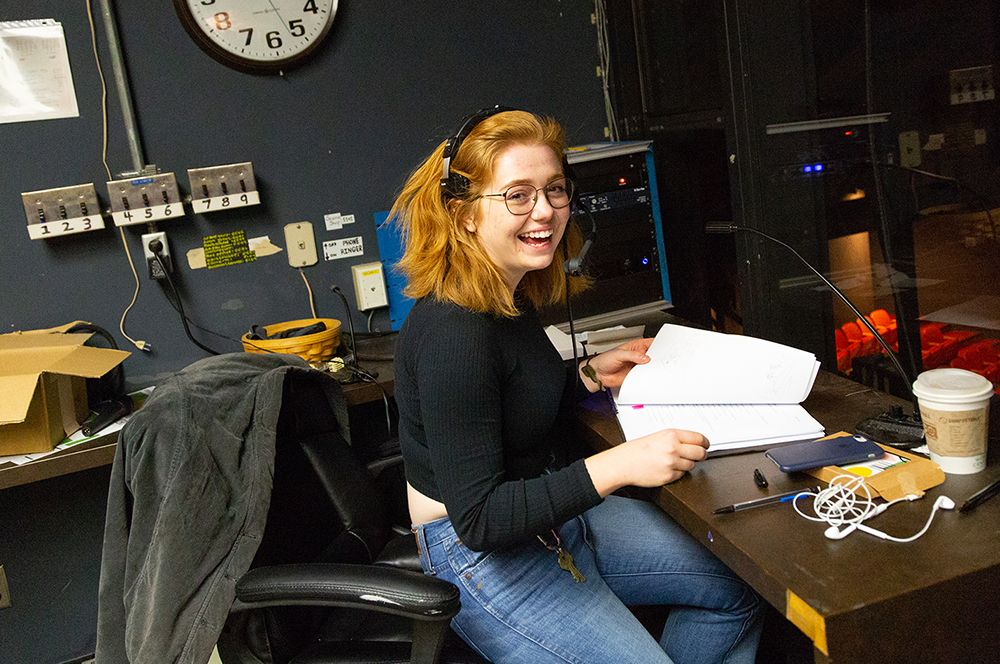 Stage manager at her desk