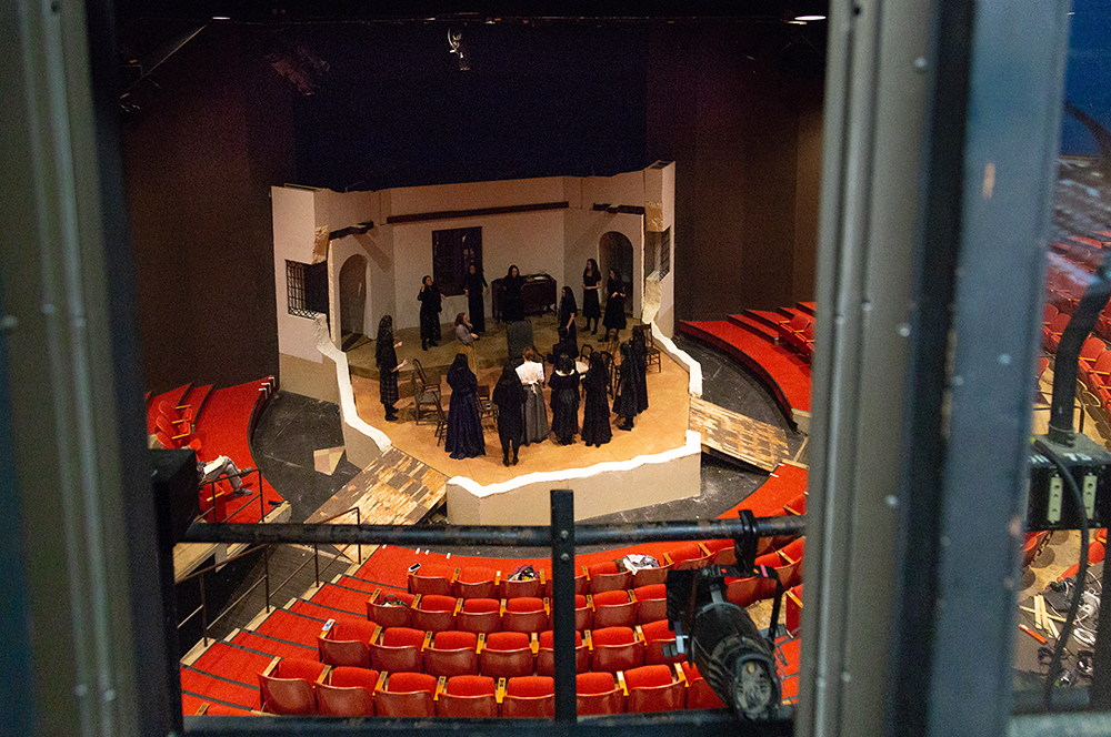 Actors rehearsing on stage