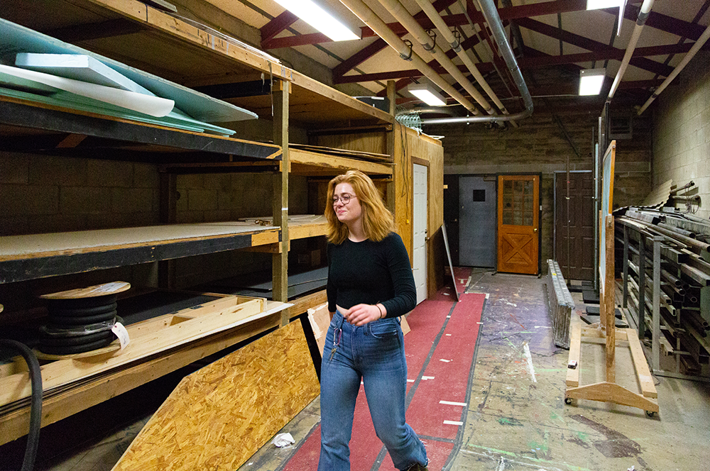 Stage manager walking backstage