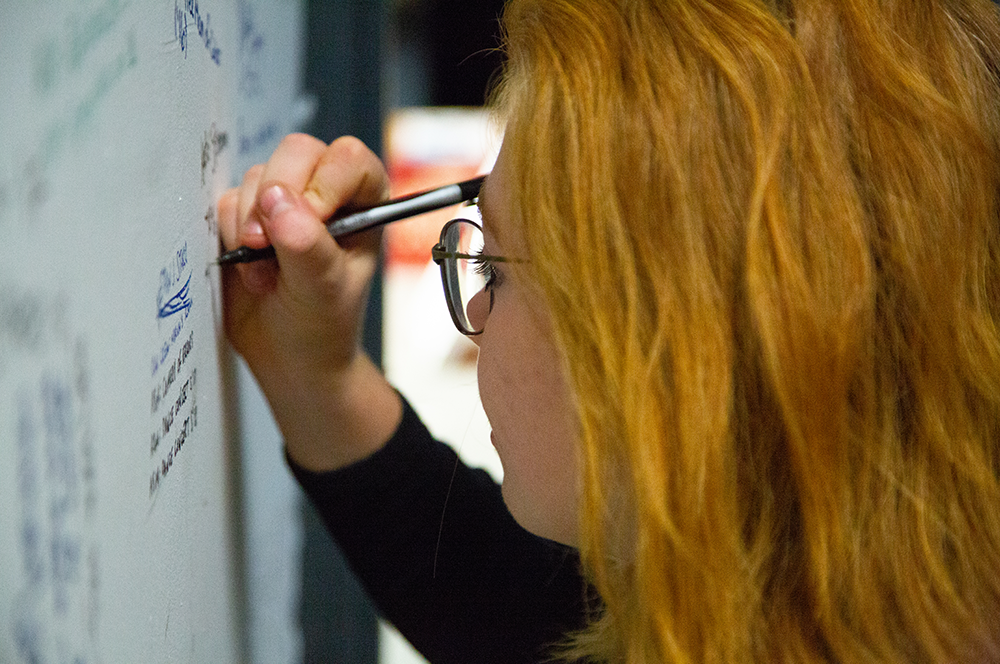 Stage manager writing on the wall